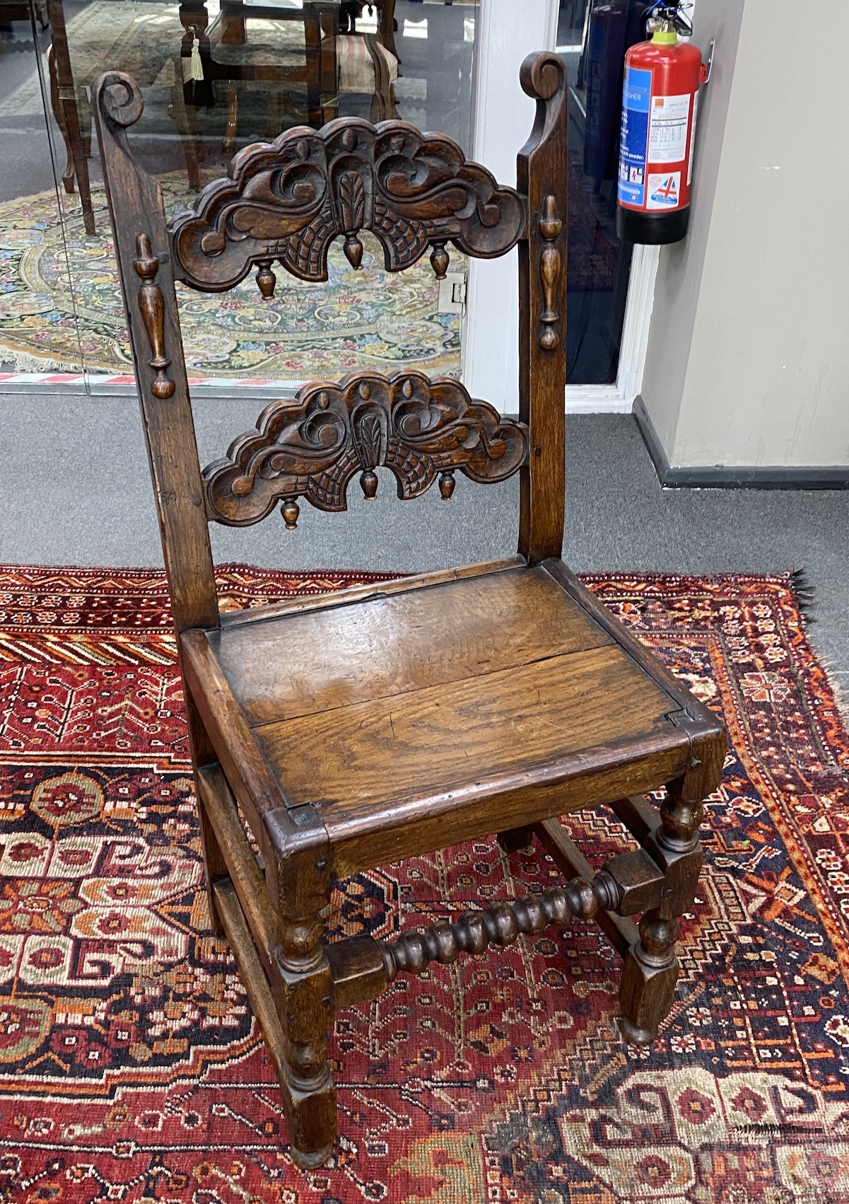 An 18th century and later rectangular oak refectory dining table, length 194cm, width 83cm, height 79cm and two Derbyshire style oak chairs
